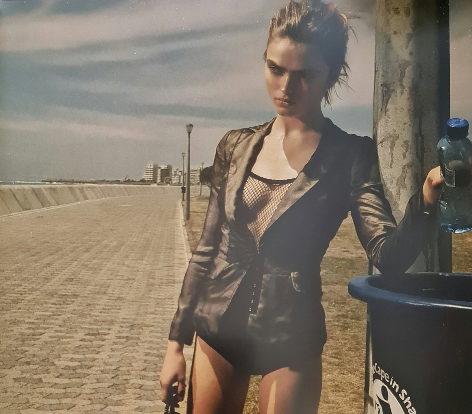 Jacques Olivar, Blue Botlle, Cape Town, 2005: Photographer: Jacques Olivar, born in Casablanca in 1941, was an advertising photographer and movie director before embracing fashion photography. Visual seduction and cinematic sensibility are keys t