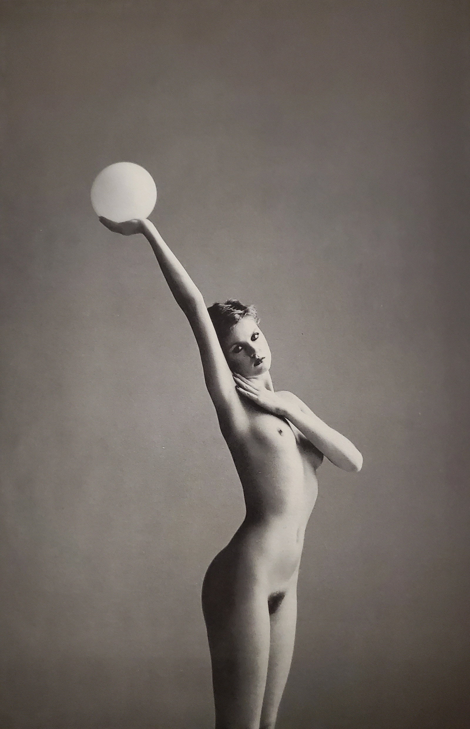 John Swanell, Catch the Moon, 1980's: Photographer: John Swannell was born in 1946. After leaving school at 16, he worked first as an assistant at Vogue Studios and then assisted David Bailey for four years before setting up his own studi