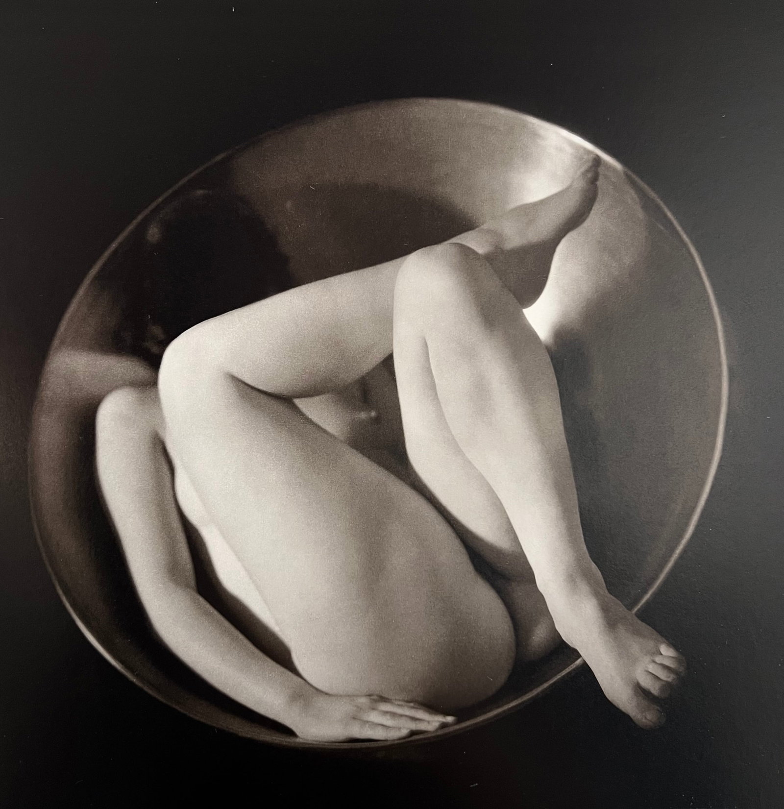 Ruth Bernhard, In The Circle, 1934: Ruth Bernhard (1905-2006) was the daughter of Lucien Bernhard, a graphic designer known as "the father of the German poster." After studying for two years at the Berlin Academy of Art, she came to