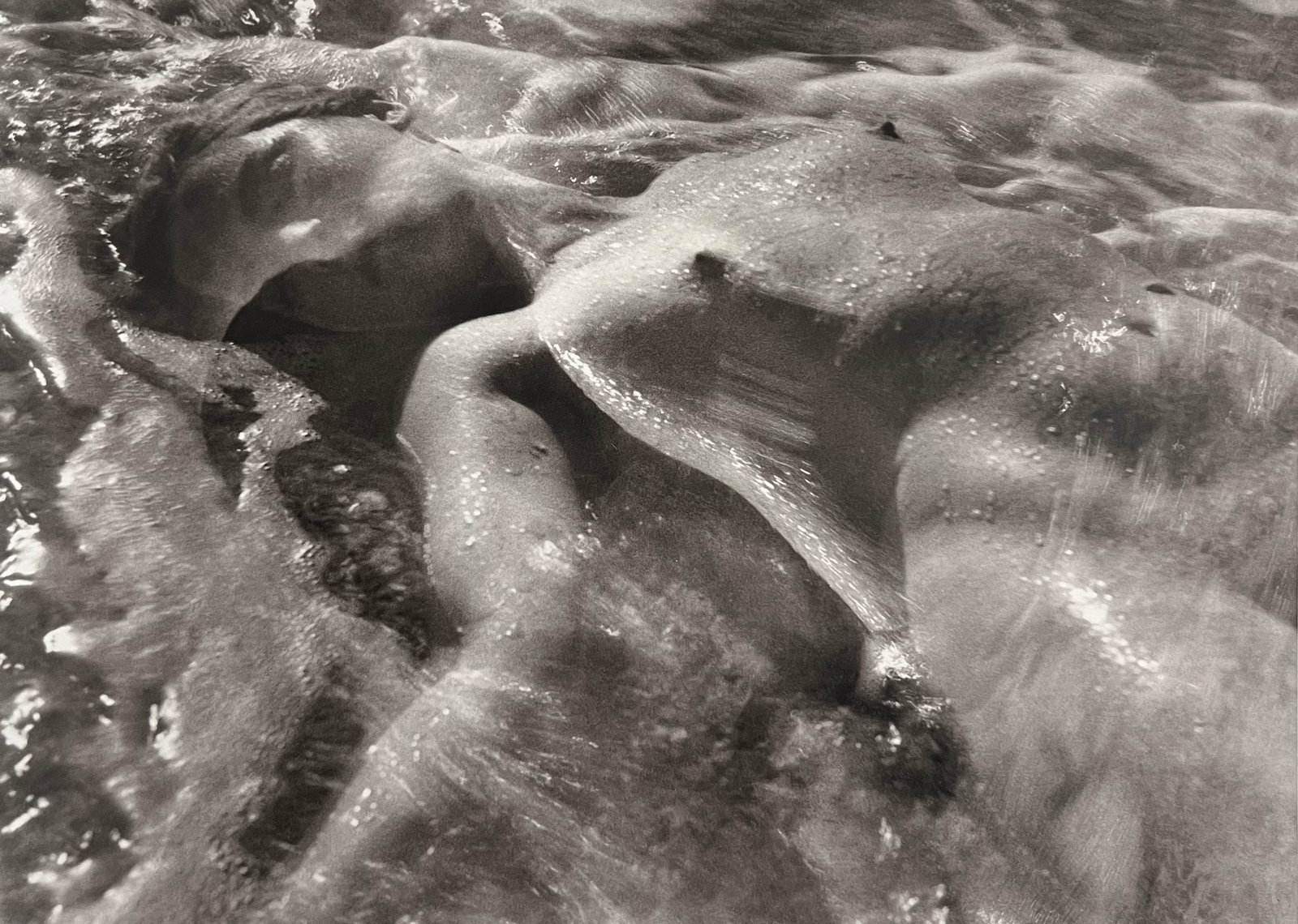 Ruth Bernhard, In The Wave, 1945: Ruth Bernhard (1905-2006) was the daughter of Lucien Bernhard, a graphic designer known as "the father of the German poster." After studying for two years at the Berlin Academy of Art, she came to