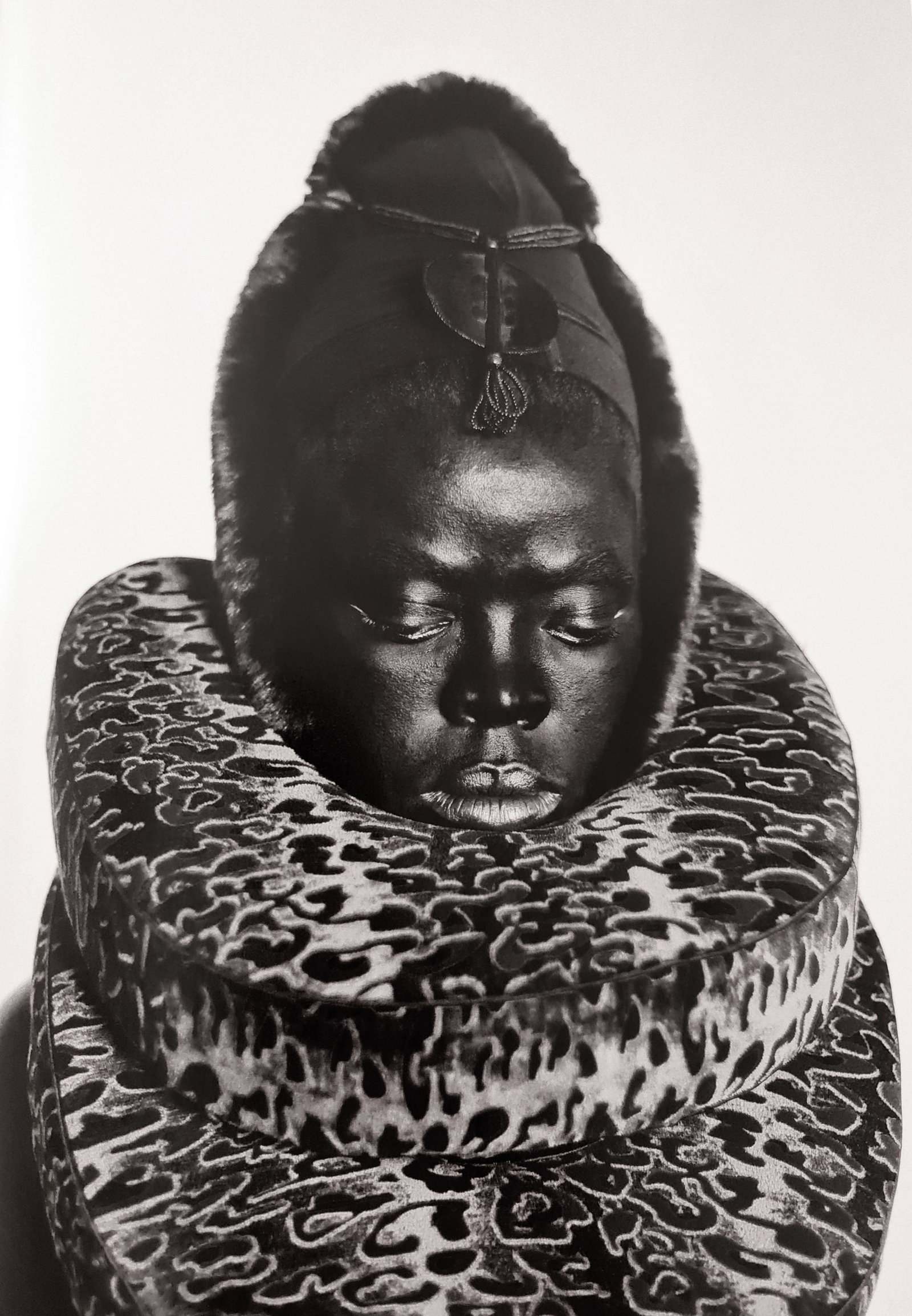 Zanele Muholi, Somnyama III, Paris, 2014: Photographer: Zanele Muholi was born in 1972. She is a South African photographer and filmmaker. Title: Somnyama III, Paris, 2014, 9 x 12.5 Date Of Negative: 2014 Type Of Print: Authentic Vintage Shee