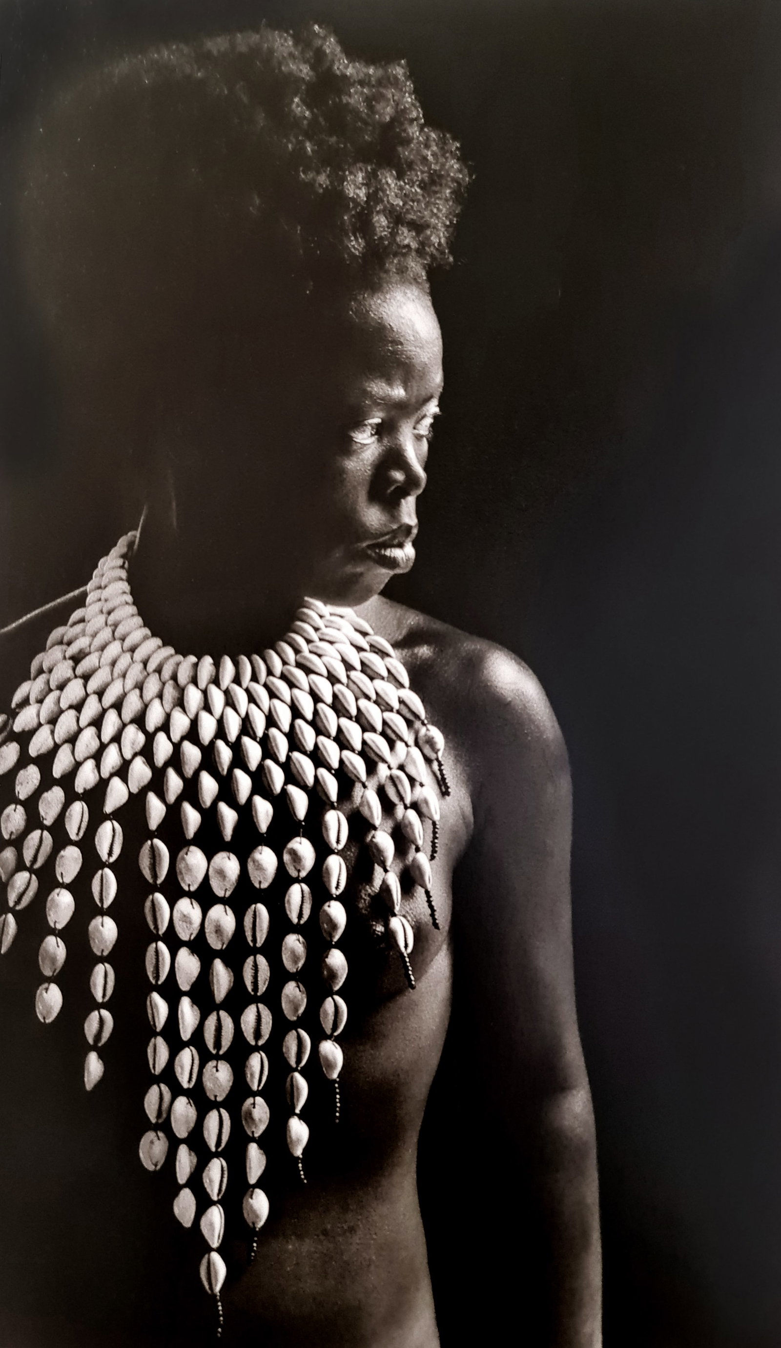 Zanele Muholi, Zodwa, Paris, 2014: Photographer: Zanele Muholi was born in 1972. She is a South African photographer and filmmaker. Title: Zodwa, Paris, 2014, 6.5 x 10.5 Date Of Negative: 2014 Type Of Print: Authentic Vintage Sheet Fed