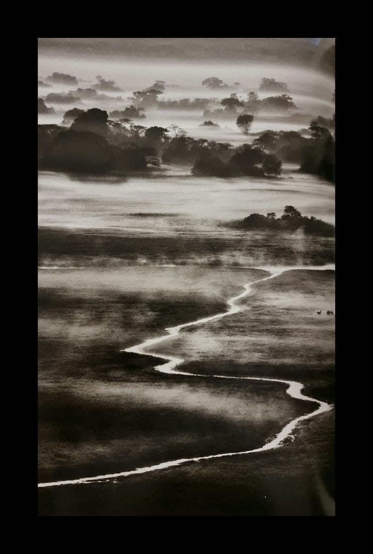 Sebastian Salgado, Chilly night in the Zambian winter, Zambia, 2010: Photographer: Sebastiao Ribeiro Salgado Junior is a Brazilian social documentary photographer and photojournalist. He has traveled to over 120 countries for his photographic projects. Most of these ha