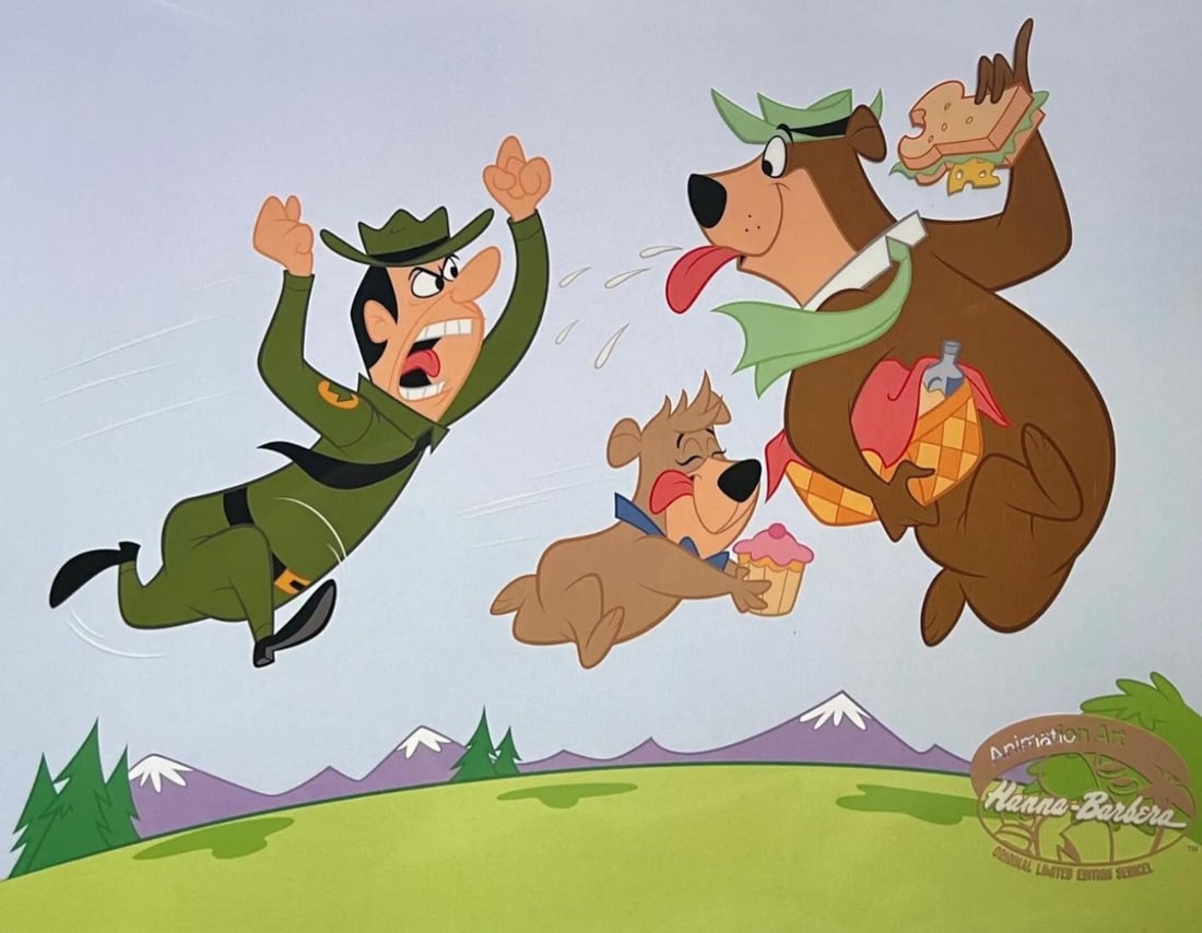 Hanna-Barbera, Yogi Bear, Boo Boo & The Park Ranger, Limited Edition Animation Cel: Limited edition artistic recreation sericel from Yogi Bear titled "Picnic Basket Stealing". This fantastic animation features Yogi Bear, Boo Boo and Ranger Smith as they appeared in the original anima