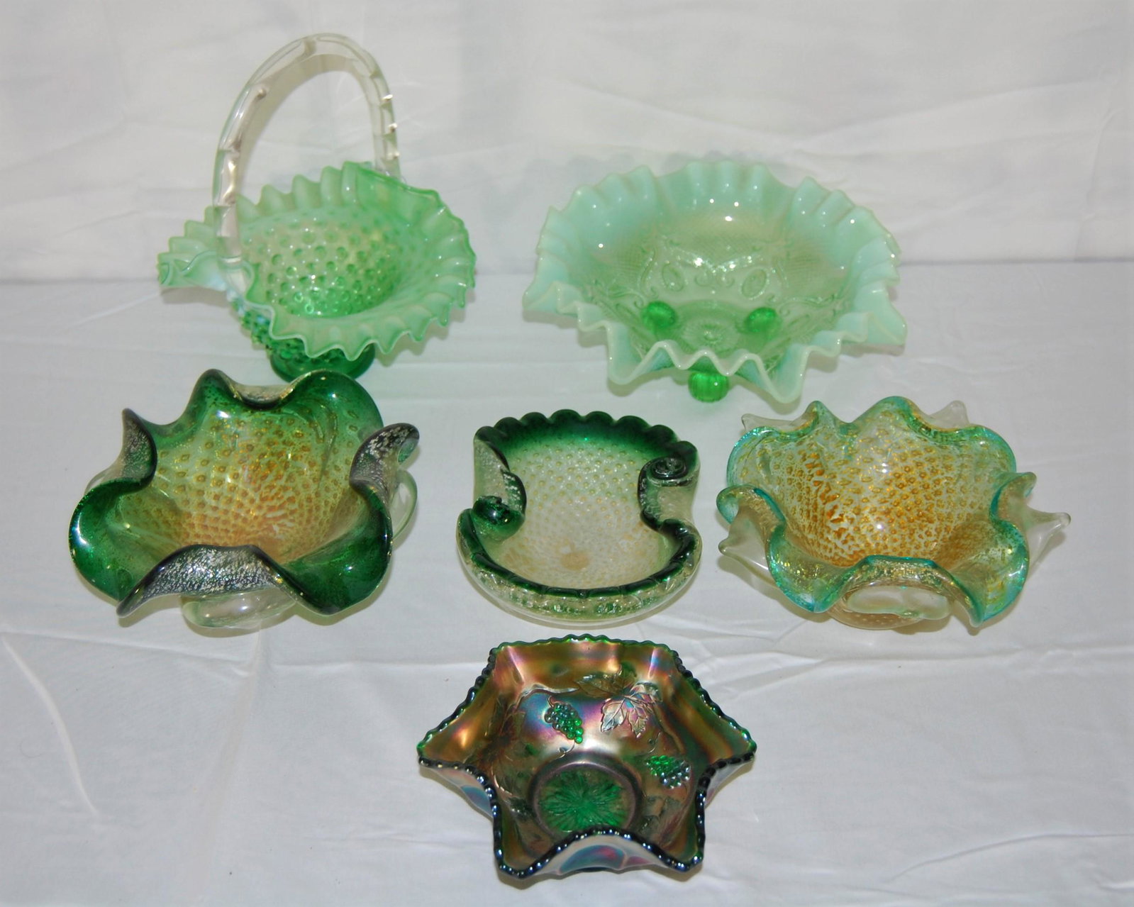 Vintage Mt Washington Compote & other Glass: Lot of Green Glass pieces. 6 pieces including: Mt. Washington three-footed compote bowl with ruffled edge, two piece mold. Green basket bowl with handle. Green handheld bowl. Grape and cable bowl, 4" 