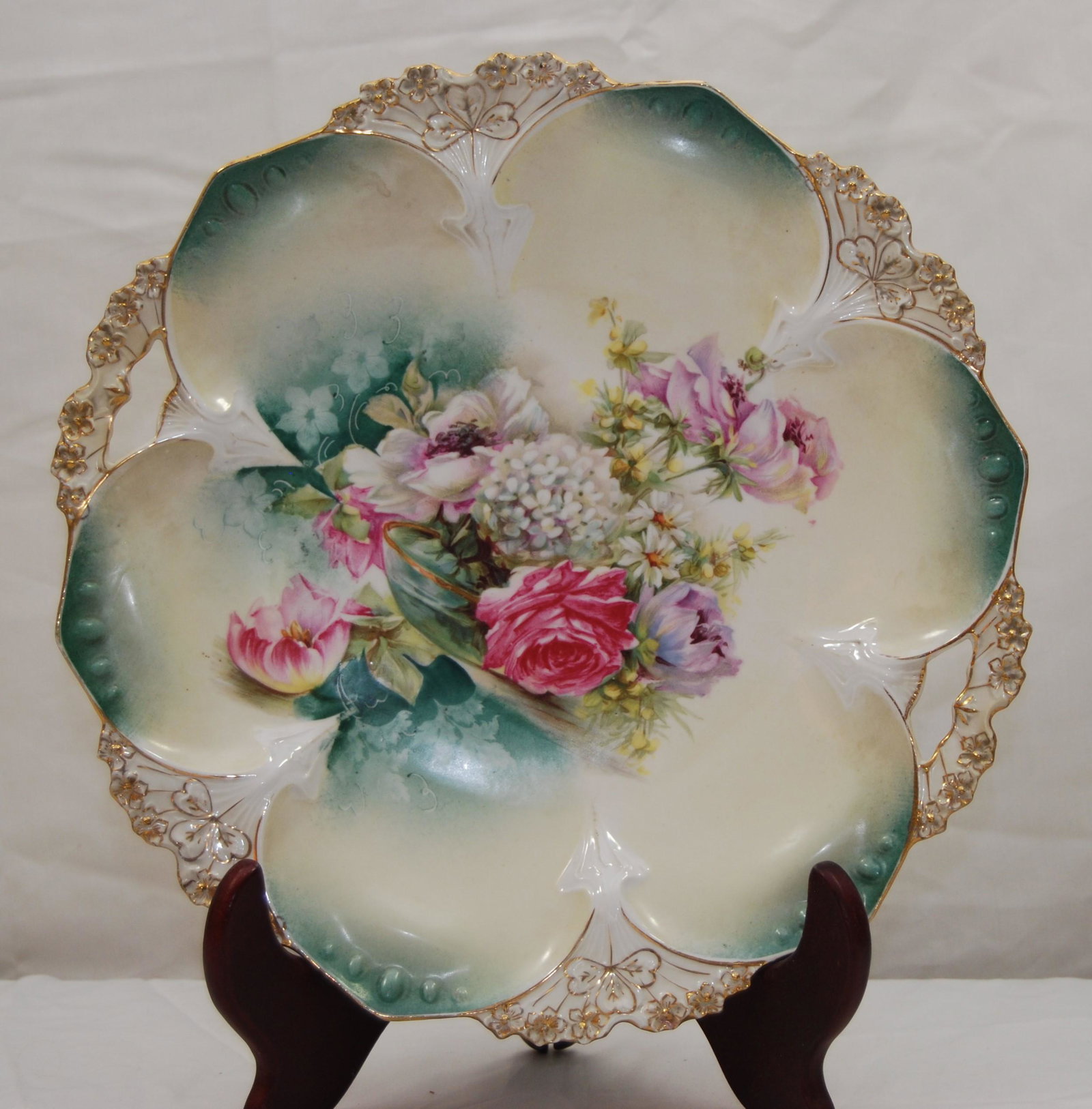 Vintage RS Prussia Plate-Roses & Snow Balls: Vintage RS Prussia Plate, Roses and Snow Balls. 11” plate, hand painted with gold gilt & pierced and scalloped edge with a six point and clover mold. Very good condition.