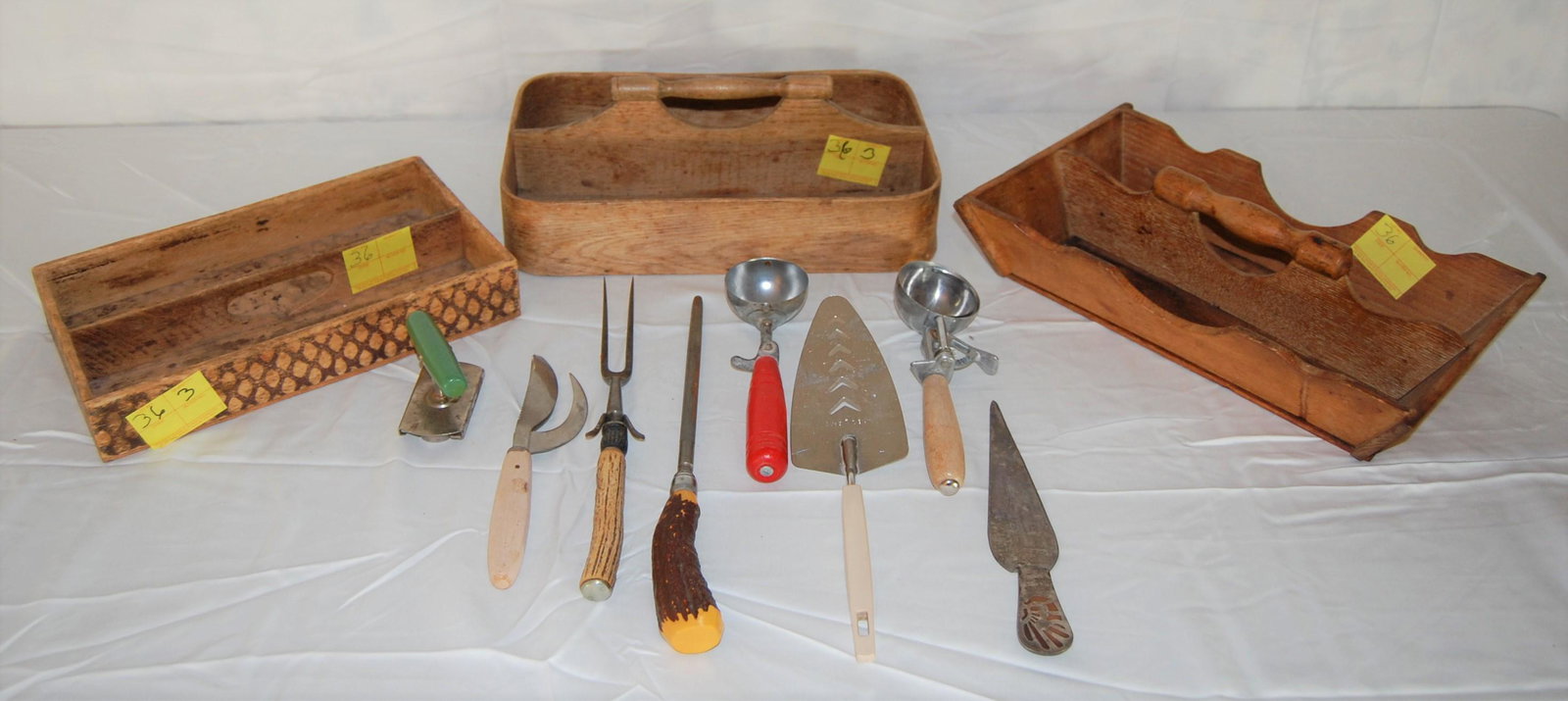 Antique Knife & Tramp Art Boxes & Utensils: 2 Antique Wood Kitchen Knife Boxes plus Tramp Art Box and Vintage Kitchen Tools. Tools include ice cream scoops, cake server, carving knife and sharper and can opener.