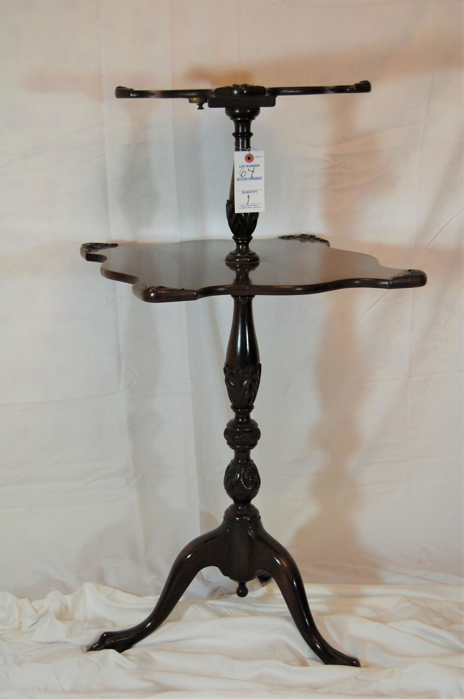 Early 19th Cent Mahogany Tilt Top Tea Table: Early 19th Century Mahogany Two-Tiered Tilt Top Tea Table. Bird cage top, paw feet, pedestal base. Pie crust cornered shelfs. Probably refinished. Circa 1800-1830. 36"h x 19"d x 19"w.