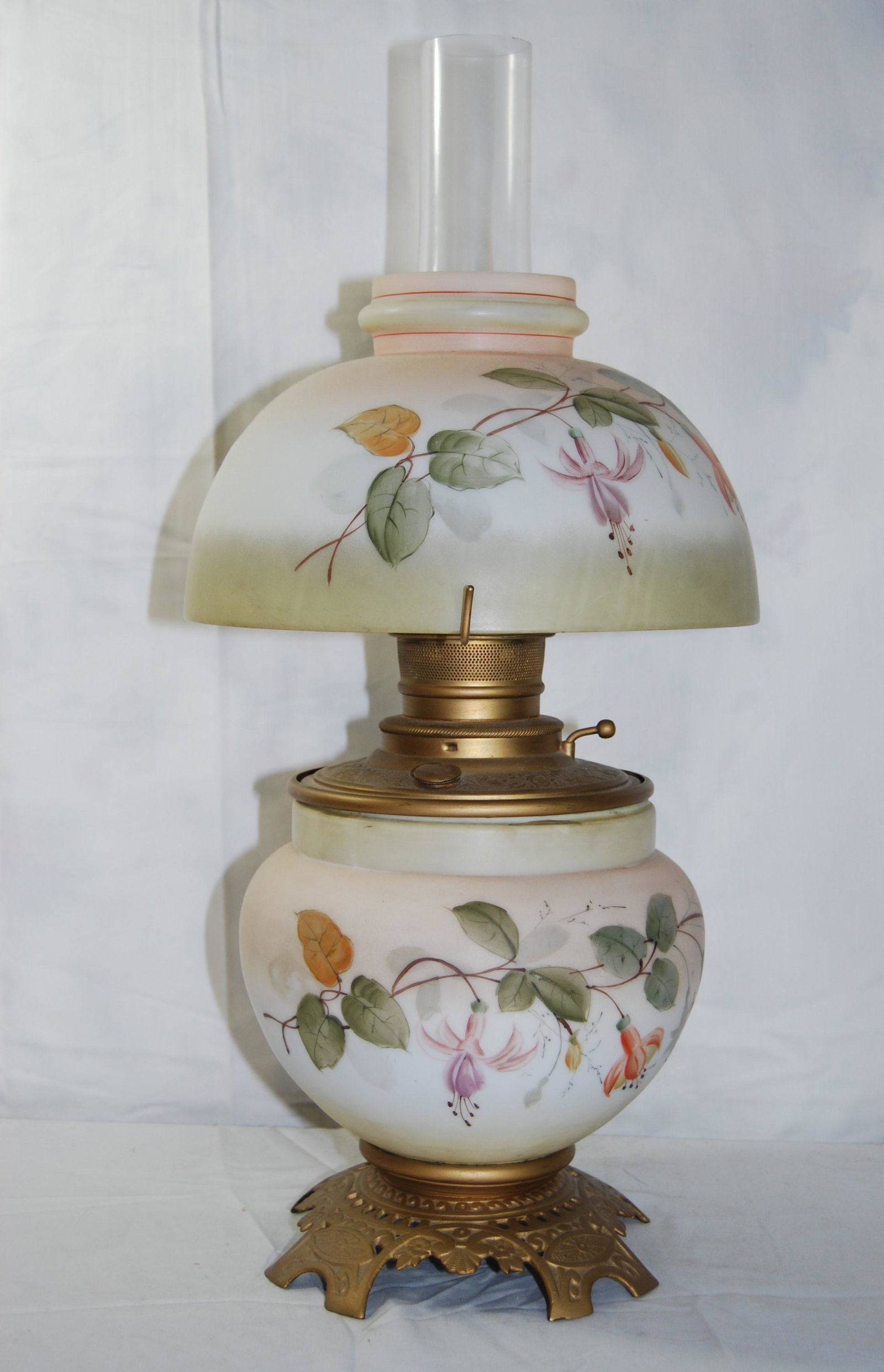 Vintage Mt Washington-Style Electrified Oil Lamp: Vintage Mt Washington Style Electrified Oil Lamp. In the style of Mt. Washington Glass Co, New Bedford MA. Lamp has a cast base, repainted, fuel tank repainted, hand painted Burmese style glass base a