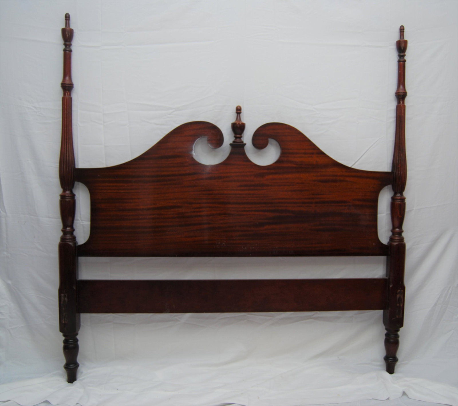 Four Poster Mahogany Bed- Chippendale-style: Four Poster Mahogany Bed. Chippendale-style, full sized with fluted posts and urn-style finials. 20th century. Includes the head board, foot board and the sides. Head board is 59"h x 57"w. Only the he