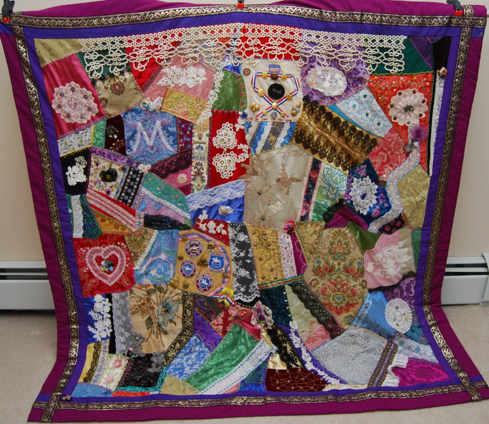 Civil War & World War 2 Commemorative Quilt: This quilt is full of history. It contains the Grand Army of the Republic badge of Patrick Henry Kelly of Spencer Mass who, in 1861, enlisted the Massachusetts Volunteers Company K 10th Regiment and s