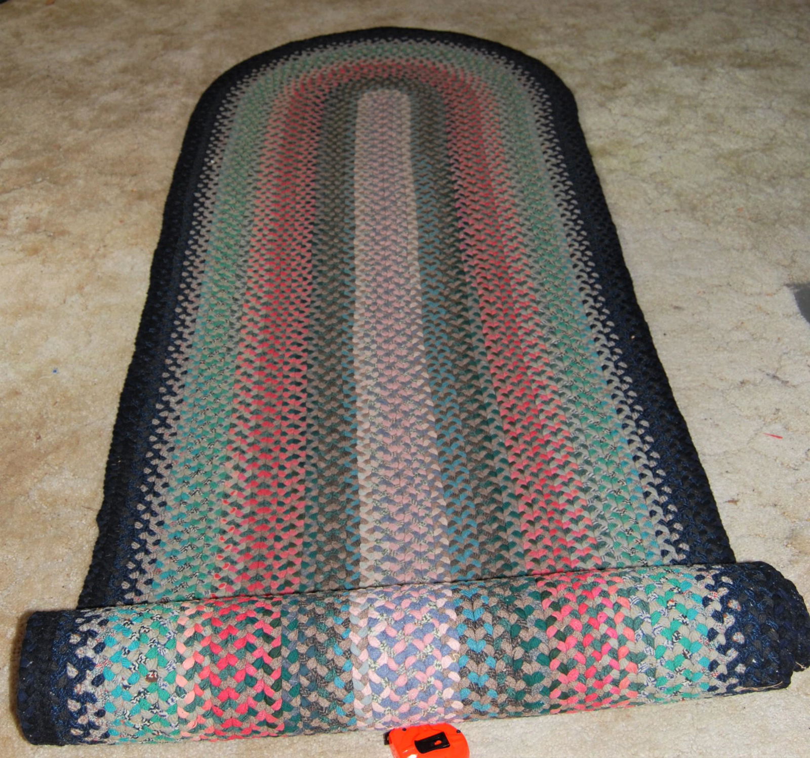 Vintage Hand-made Braided Wool Rugs-lot of 4: Vintage Hand-made Braided Wool Rugs, 1950s Era. Lot of 4 rugs including a multicolor long runner in good condition, 11’4” long x 31”wide. Also – oval rug in green & blue in goo