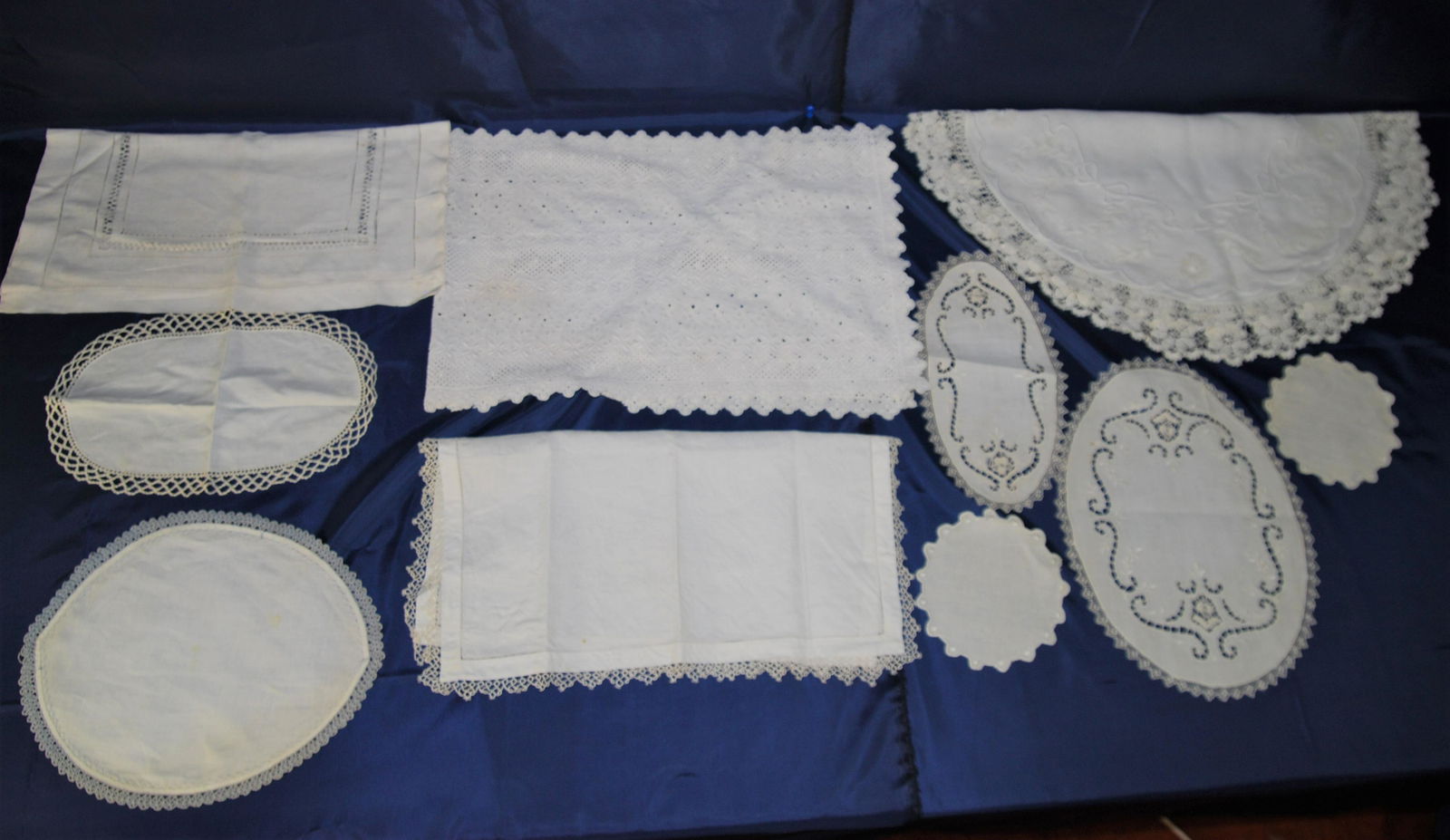 17-Antique Handcrafted Textiles-Linen, Lace: Antique & Vintage Handcrafted Textiles – Linen & Lace Table Runners & Toppers. 17 items of varied sizes in this lot. The green and lace runner is 33” long x 15” deep. These textiles,