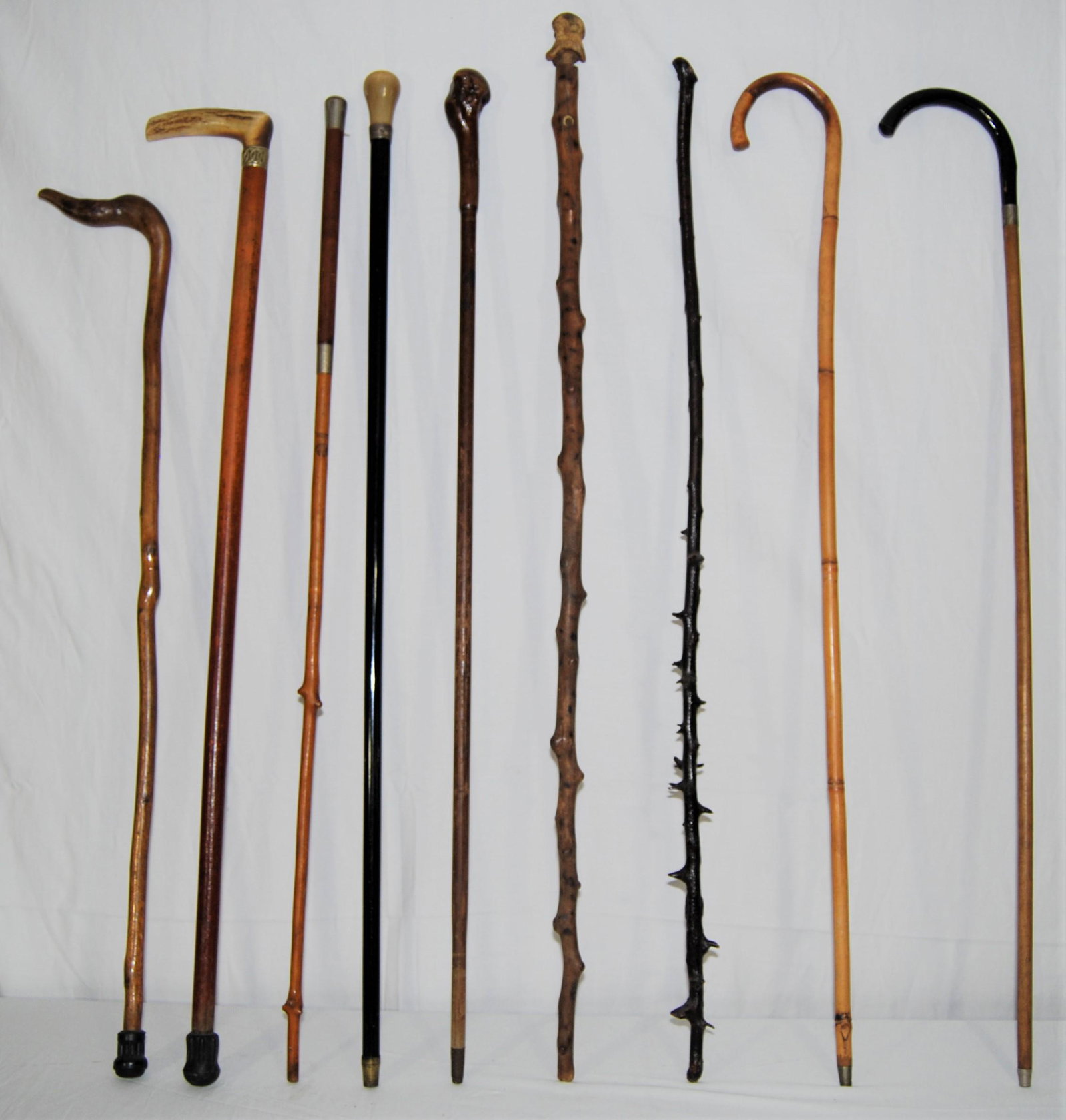Antique Shillelagh-Canes-Walking Sticks-lot of 9: Antique Shillelagh, Canes & Walking Sticks. Nice assorted lot of 9 items including: an Irish blackthorn-like shillelagh with the knurled-knob handle, a bone-knobbed cane, a walking stick with a verteb