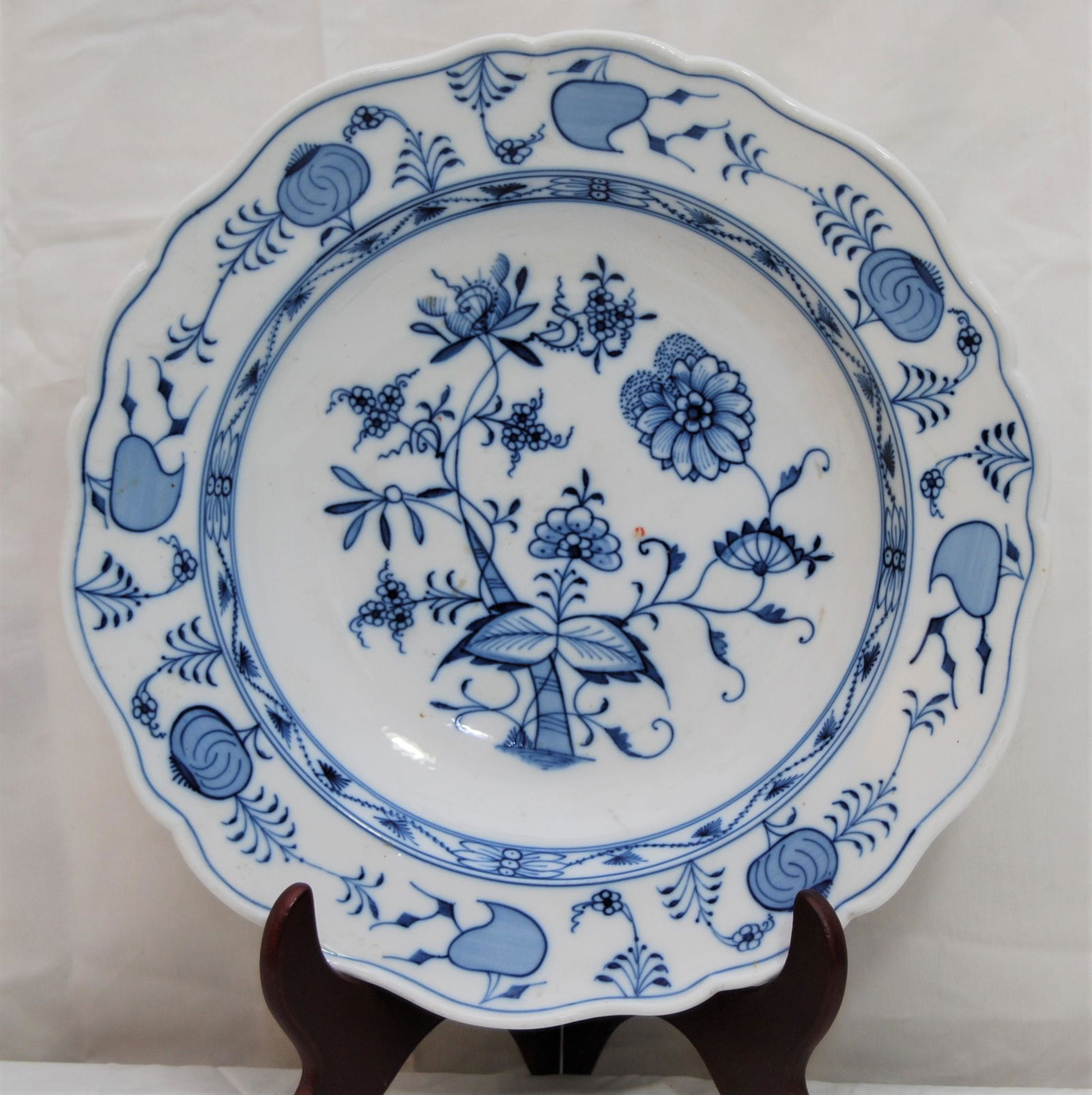 Meissen Bowl-Blue Onion Pattern- 13”: Meissen Bowl in the Blue Onion Pattern. Scalloped edge. 13”. Meissen oval mark with crossed swords above the oval are on rear.