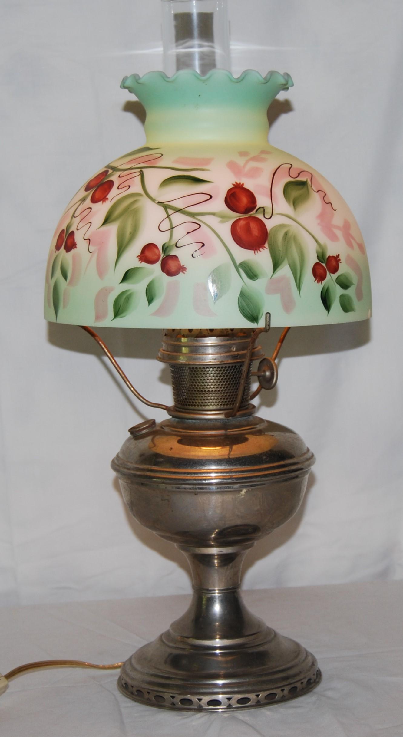 Antique Aladdin No 11 Electric Oil Lamp-1920s: Antique Aladdin Nickel Plated No 11 Oil Lamp Converted Electric with Vintage Milk Glass Shade. Model 11 was early 1920's. Some tarnish and a 1" dent on the underside of the oil font, not very visible.
