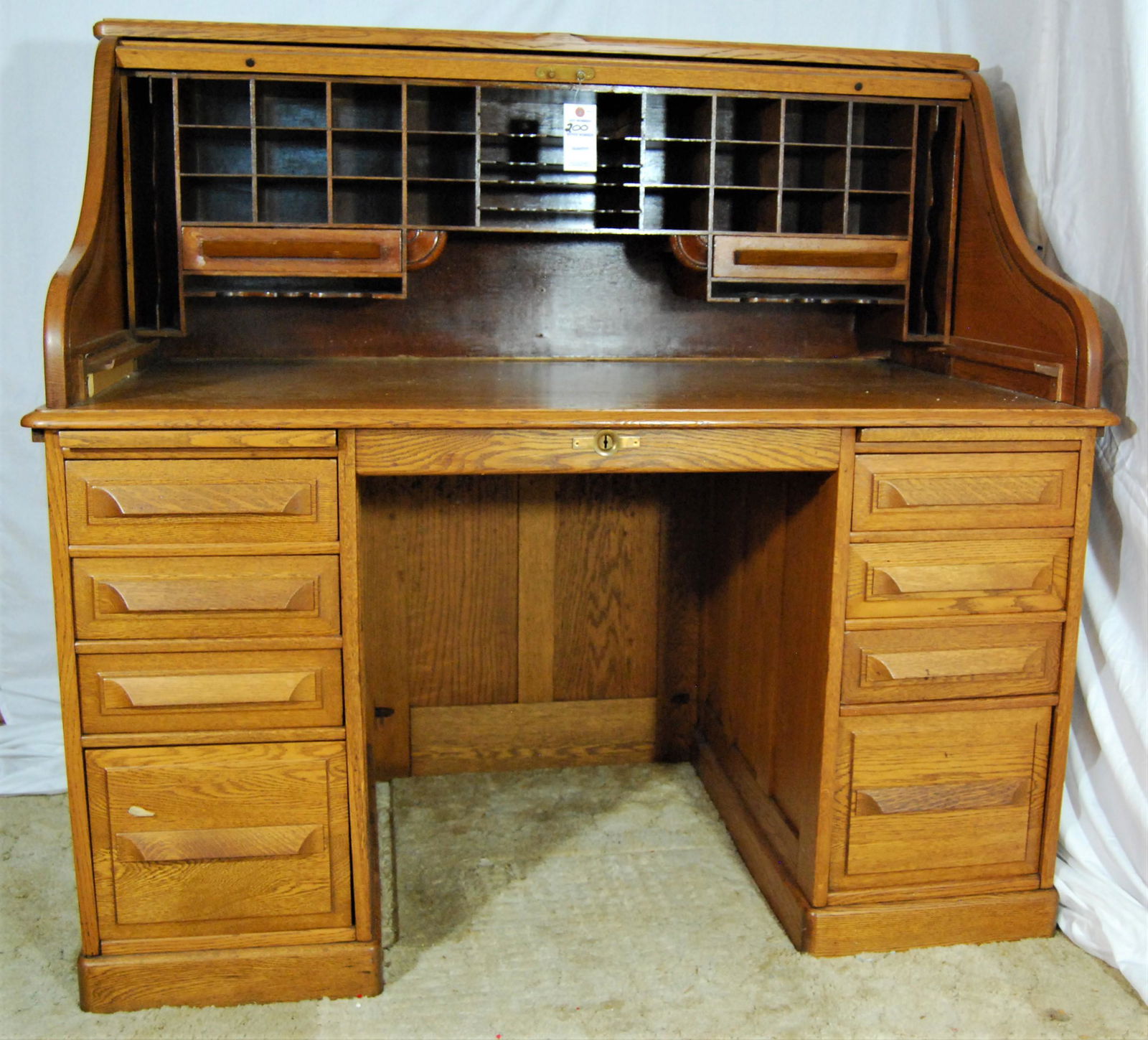 Vintage Quartersawn Oak Roll Top Desk by Cutler: Vintage Cutler Oak Double Pedestal "S' Shaped Roll Top Desk, plus Vintage Oak Office Chair. Beautiful early 1900's desk. Quartersawn oak, paneled sides, back and knee hole. Fitted interior with 35 rec