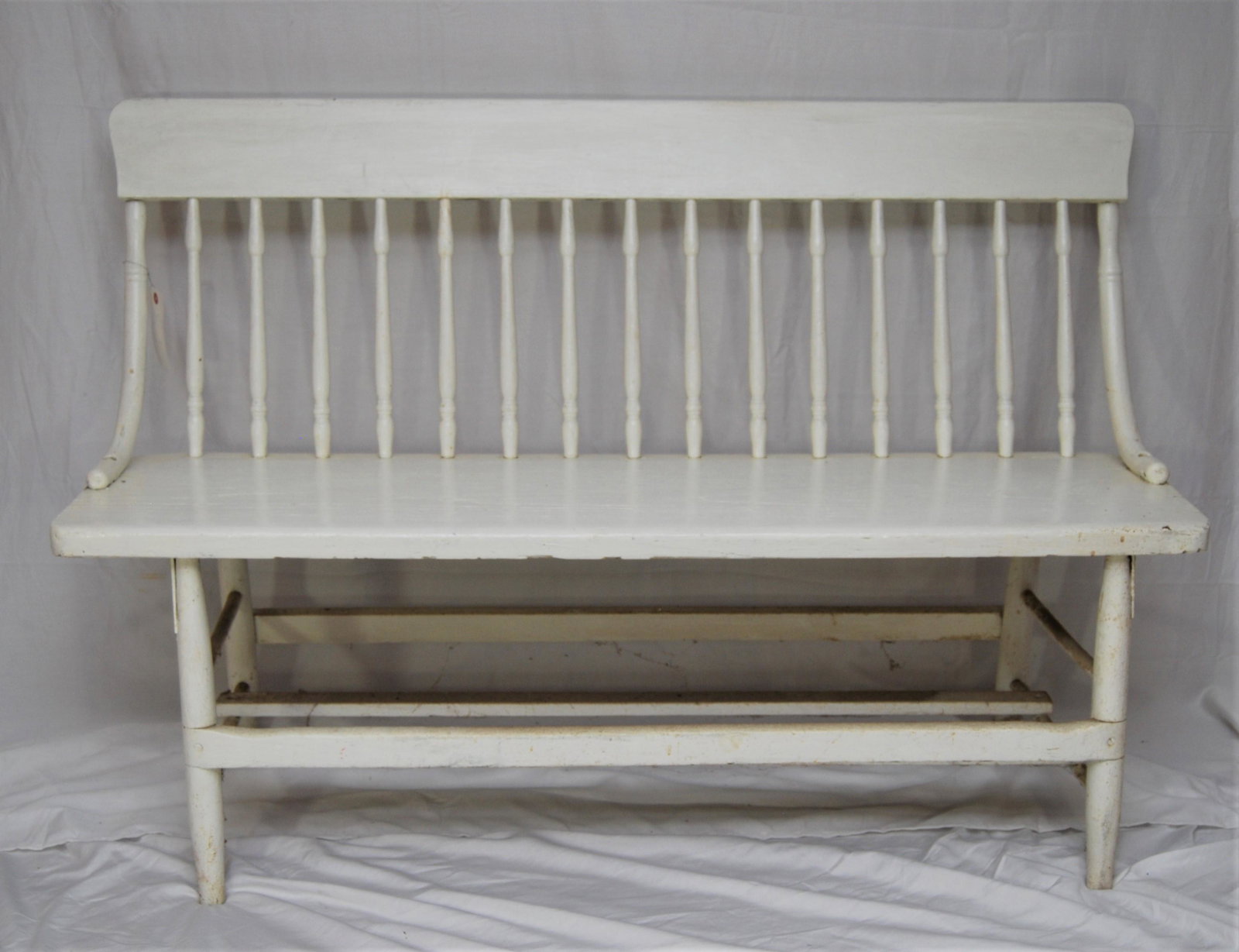 Antique Windsor Painted Deacon or School Bench: Antique Windsor Country School or Church Bench. Painted White. Country back with one plank seat and turned spindles and legs. Late 19th or early 20th century. Nice country piece. 33"h x 17"d x 48"w.