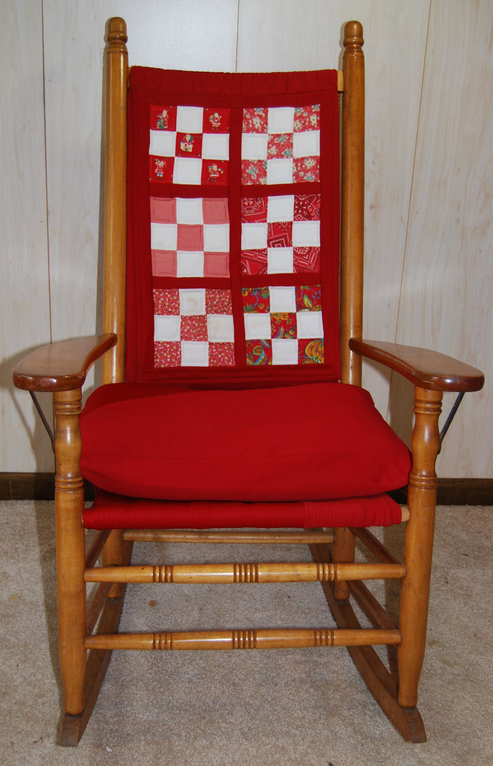 Presidential Porch Rocker-Custom Quilt Back Pad: Presidential Porch Rocker. Maple, contemporary. Rope seat, rush back. The seat is covered with a custom pillow, the back has a custom quilt back-pad both hand made by the late Mary Madden of Spencer M