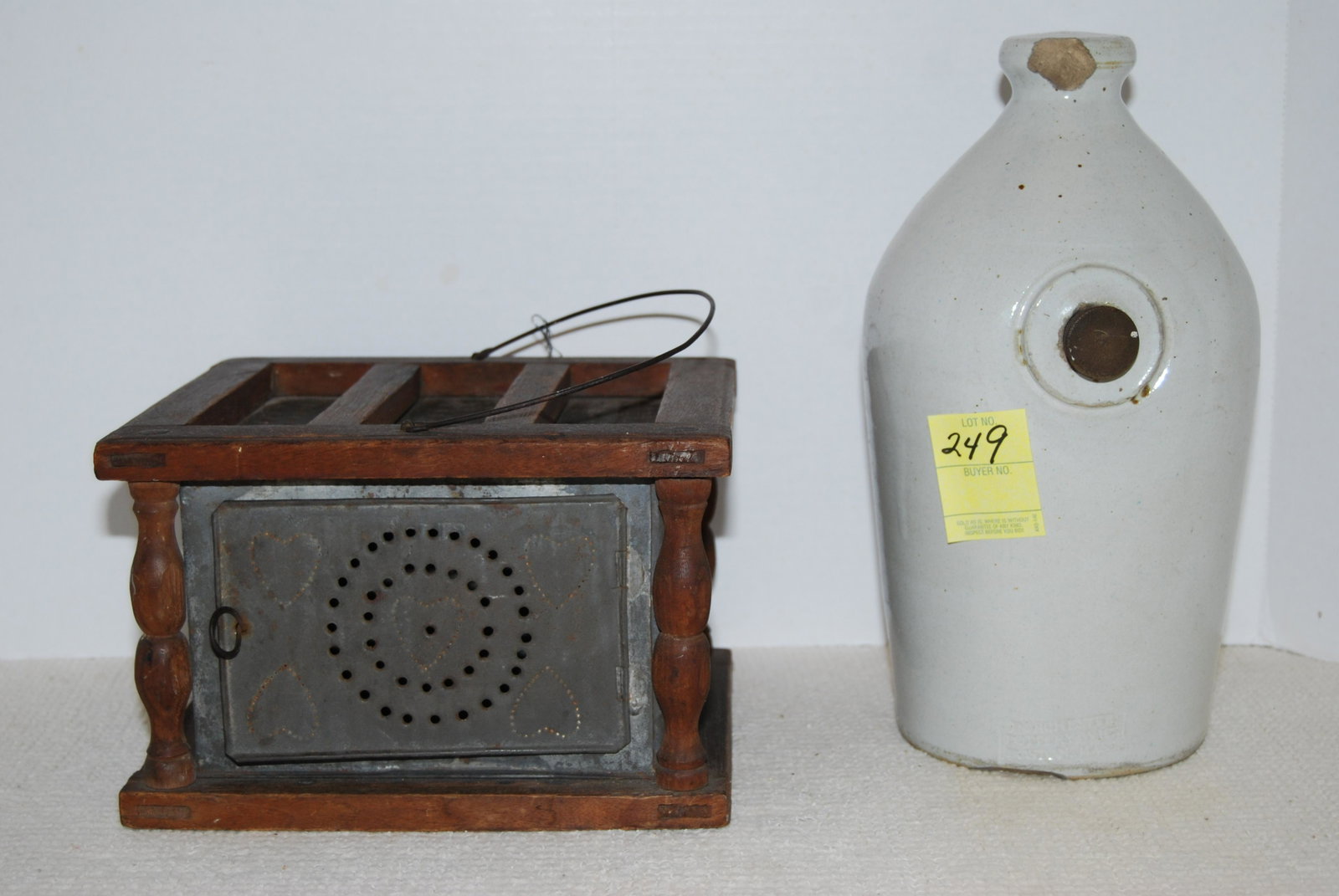 Two - 19th C. Footwarmers - Tin & Wood + Pottery: Antique Footwarmers - Rare Dorchester Pottery Works Footwarmer and an Early Wood & Punched Tin Heart Foot Warmer. Lot of 2 items. The ornate tin and wood footwarmer has 5 hearts punched into each of i
