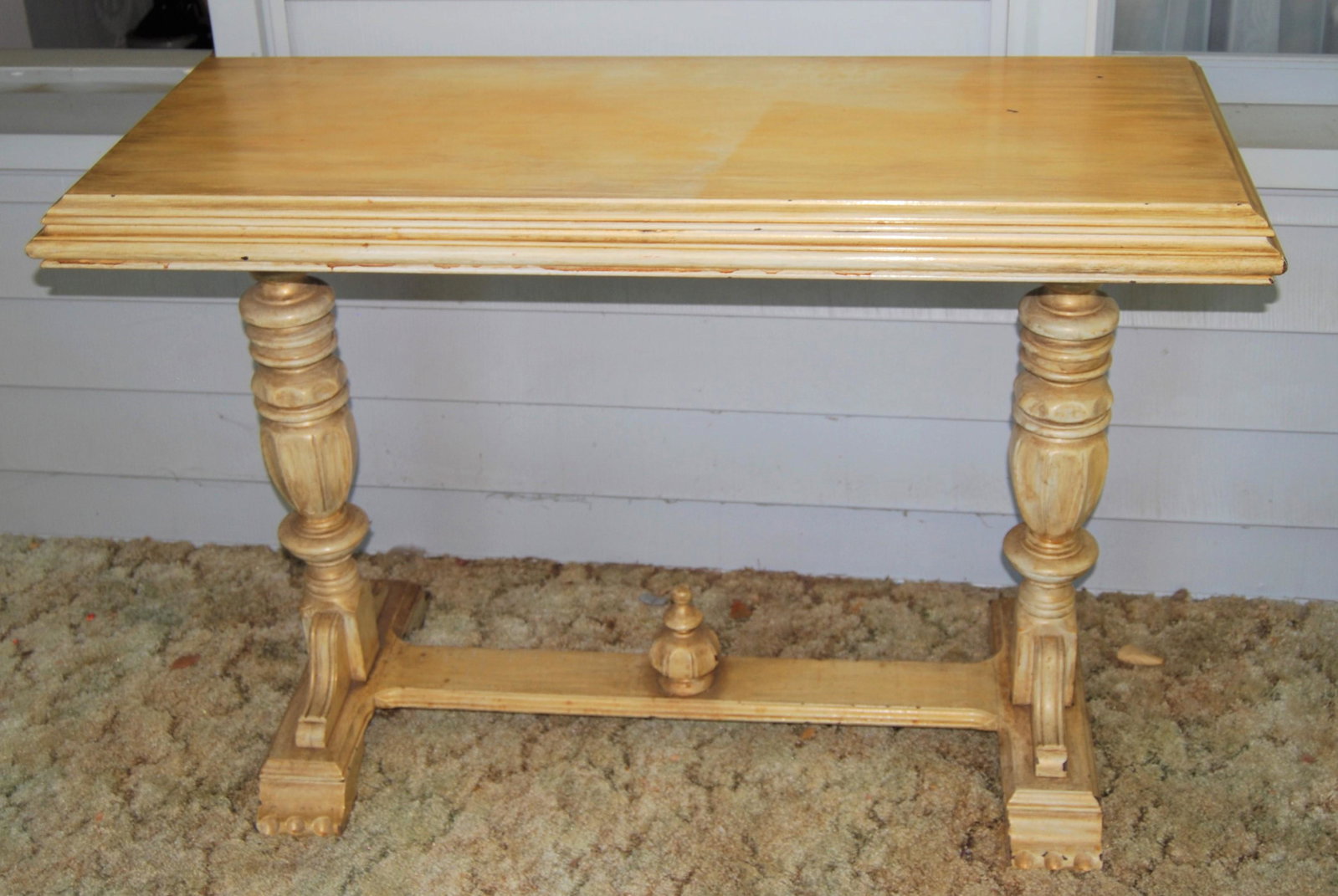 Victorian Console Table-painted mustard yellow: Victorian Sofa or Console Table – Early 1900’s mahogany table painted a mustard yellow color. Nice turnings and carvings, flat paw feet. 29”h x 43”w x 17”d.