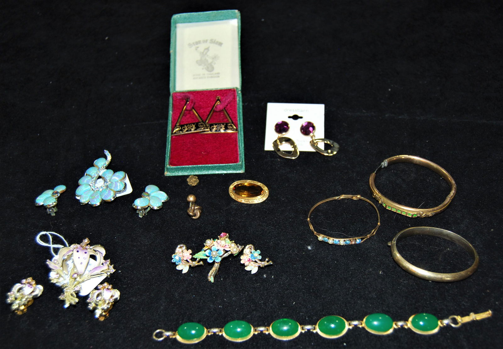 Vintage Earrings & Brooch Set plus Bracelets: Vintage Earring & Brooch Sets & Bracelets. Lot of 12 items including: an enamel and Rhinestone 3 piece set, Star of Siam earrings, green stone bracelet, 3 gold colored bangles.