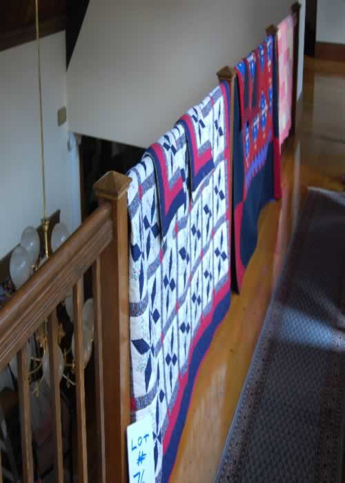 Quilts-Lot of 3: Three machine made quilts (1) star with matching shams, (1) Amish color block with shams, (1) melon, pink, yellow stripe