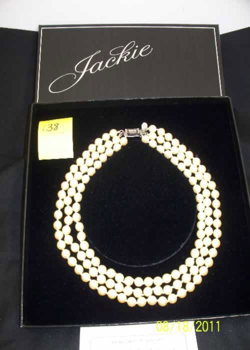 Jackie's Pearls: Jackie's pearls, 18", Franklin Mint, triple strand faux pearls on hand-knotted silken cord, the silver art deco-style clasp is cast from the famous original & carries the silver monogrammed symbol of 