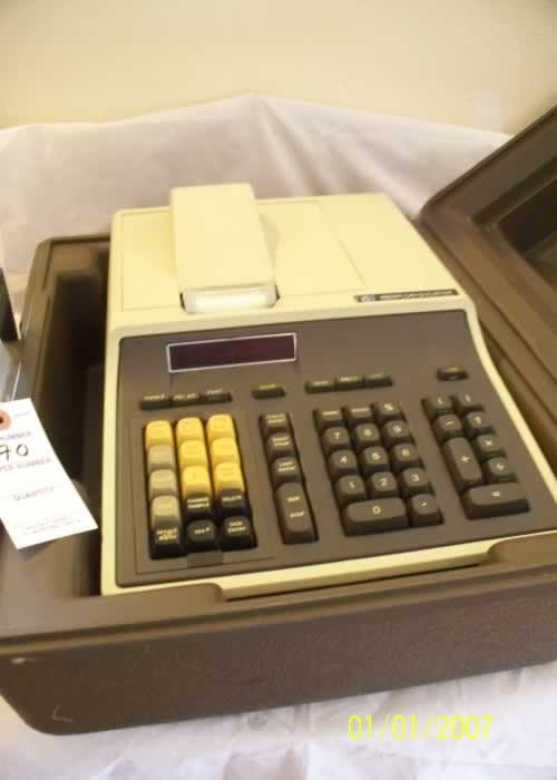 Vintage Desktop Calculators: Lot Vintage Desktop Calculators, (1) Hewlett Packard model # 9805A, 1960's, a desktop graphic adding machine, in working condition with original carrying case, (2) Wang model 87's, 1973, specialty sur