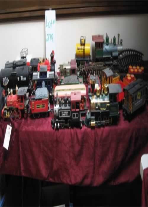 Toy Train Collection: G gauge Collection includes (7) assorted engines, (17) assorted cars, aprox. (30) 10" str. track, (13) curved track 054, (2) trestles