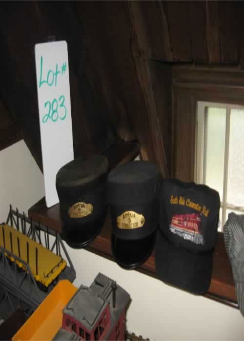 Train Enthusiast Collection: Train Enthusiast collection includes (2) Amtrack Conductor Hats, (3) assorted train hats, train bookends, mugs, magnets & more