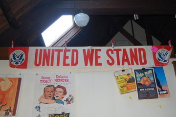 Original World War Two Era Poster: World War II Poster, Original, dated 1941. "United We Stand" large banner-type poster depicting the Presidential Seal in both corners flanking "United We Stand" in the middle. by the US Government Pri