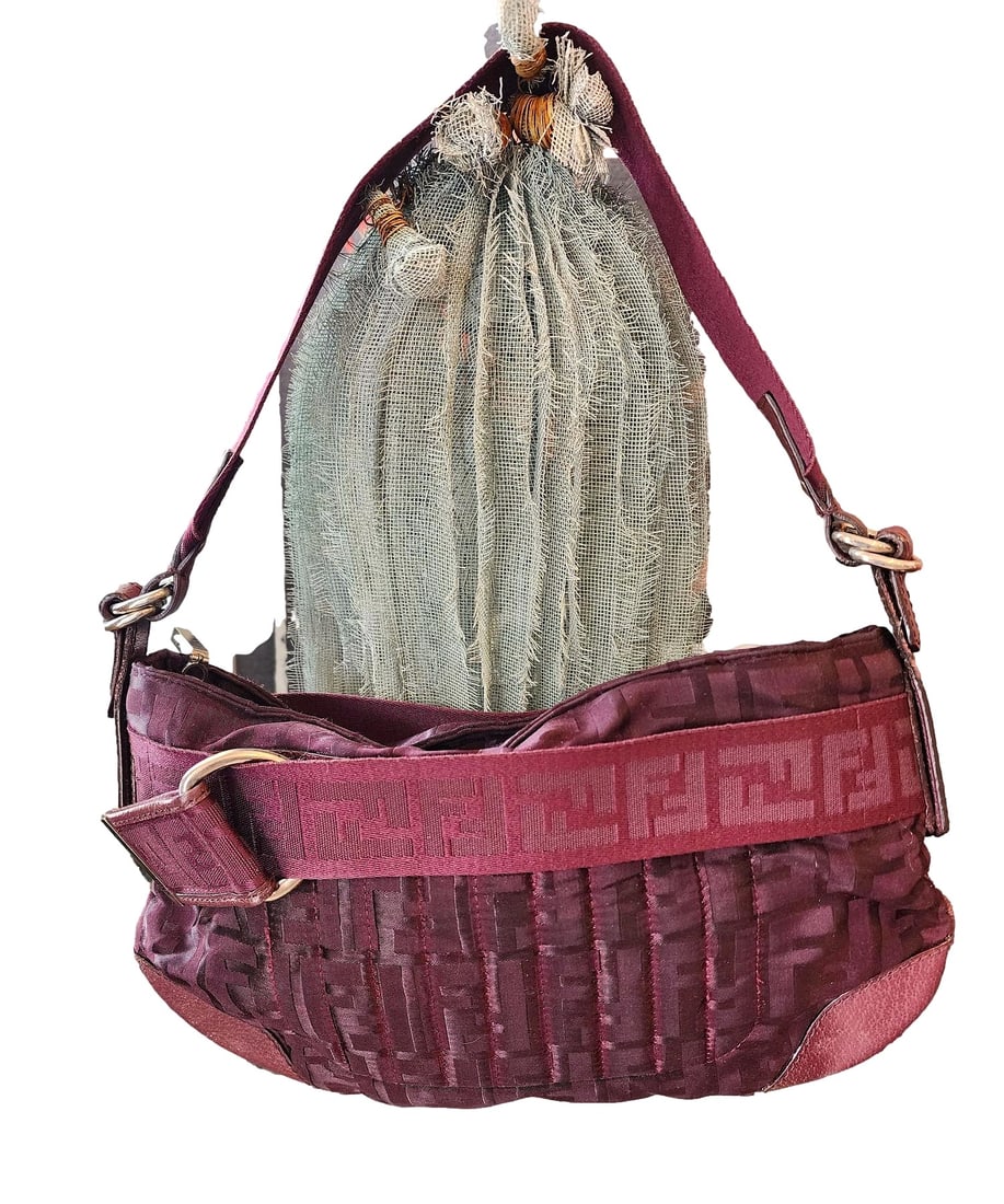 Fendi Purple/Burgandy Canvas Zucca Handbag.: 12 x 7. Bag features main zipper closure, and exterior zipper pocket. No interior pockets. I do not have the dust bag for this purse. Certificate of Authenticity is included. NO RESERVE.