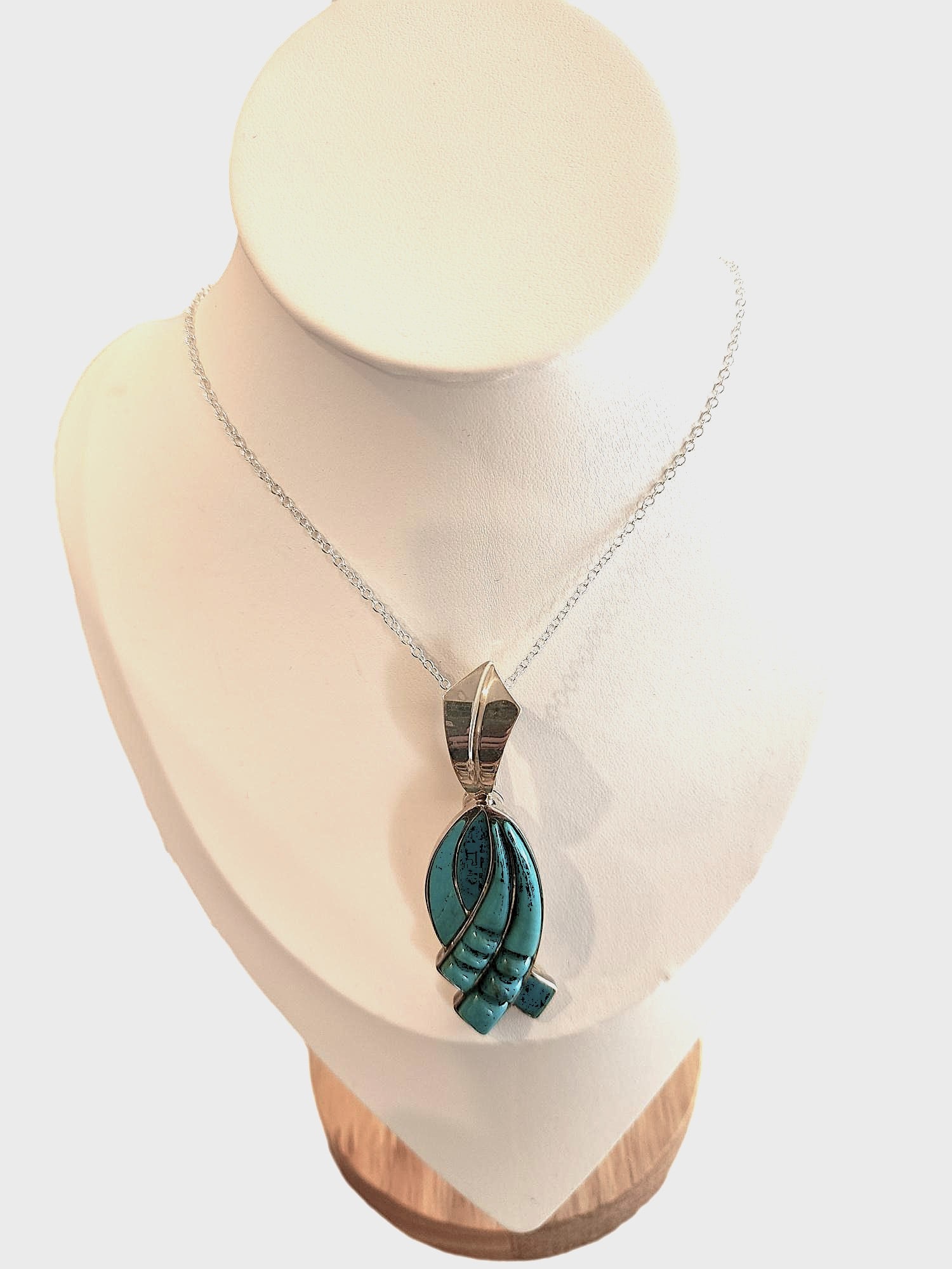 Jay King Desert Rose Trading Sterling Silver Pendant with 2 tones of Turquoise in an cross pattern.: 2 3/4" pendant. This piece has an opening latch on top with a magnetic closure. It is a challange with the silver chain, 21" silver plated chain.