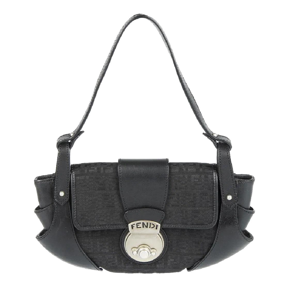 Fendi Black Zucchino Compilation Baguette Handbag. Comes with unbranded Dust Bag. Previously Owned.: 11" x 6". This bag is in very good condition. The leather shows some matial annomolies. Pictures Provided. Certificate of Authenticity Included. A single interior pocket. Brushed Silver latching closu