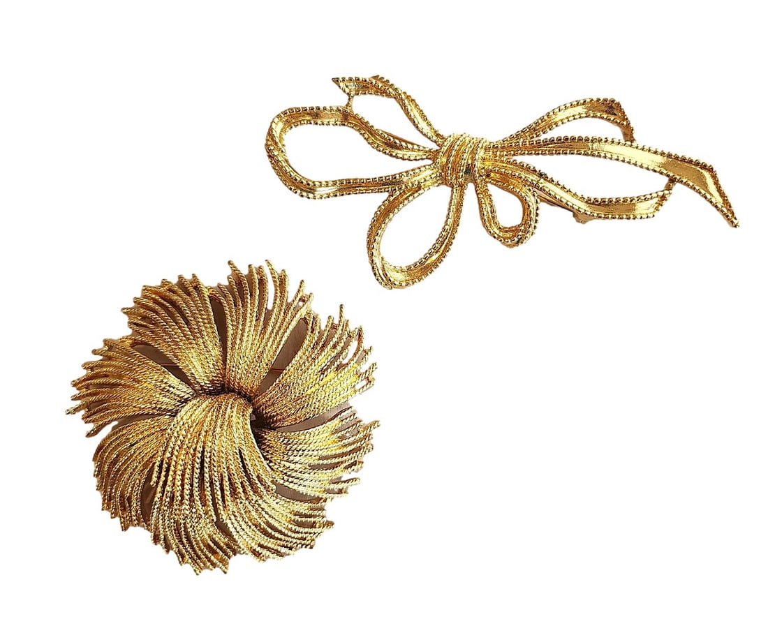 2 Vintage Gold Brooches. One marked MONET and the Bow is marked TRIFARI. NO RESERVE: 2 3/4" Diameter and just over 4" for the Bow.