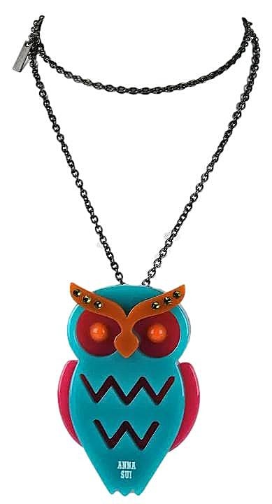 Artisen Crafted Acrylic Owl necklace by Anna Sui. Can be a Necklace or a Brooch. Hallmark Tag and: Unique Piece featuring a Blue Owl Body with Hot Pink Wing and Eyes. Owls Eyebrows hold green stones, with red stone eyes. Artist Signate on the base of the Body.