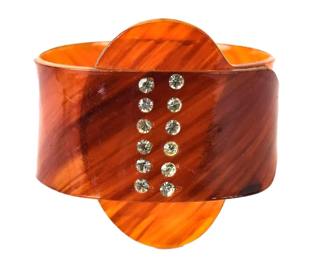 Vintage Faux Tortoise Acrylic Slip On Bracelet with Rhinstones. C. 1960's. 2 1/2"'s Diameter. No: Nice Piece with unique simplicity.
