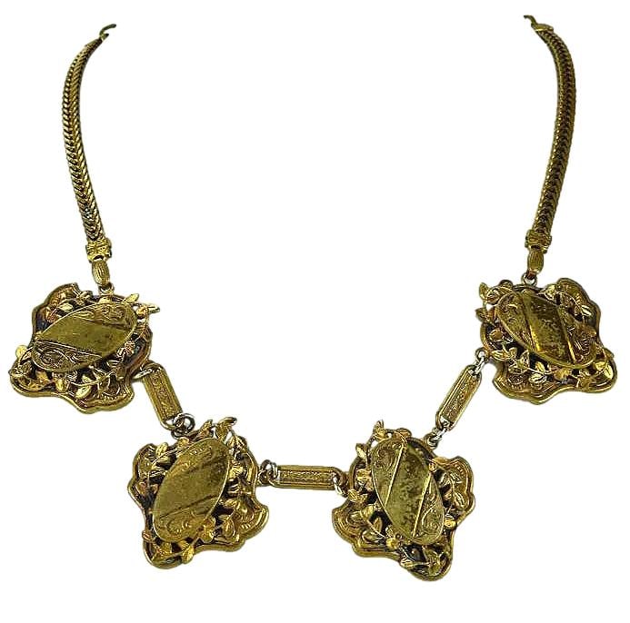 Vintage C. 1940 Victorian Style Gilt Metal Necklace. Appears Hand Stamped. Very Intricate Decoration: Very detailed decorations. Each piece marked and the links in between are also decorated . Nice collector piece.