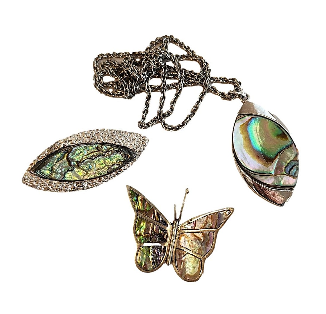 Abalone suite includes a necklace and 2 pins. Necklace with matching pin marked Exquisite and: Necklace 27" - pendent 2". Matching pin - 2 1/2" Butterfly 2" at widest point.