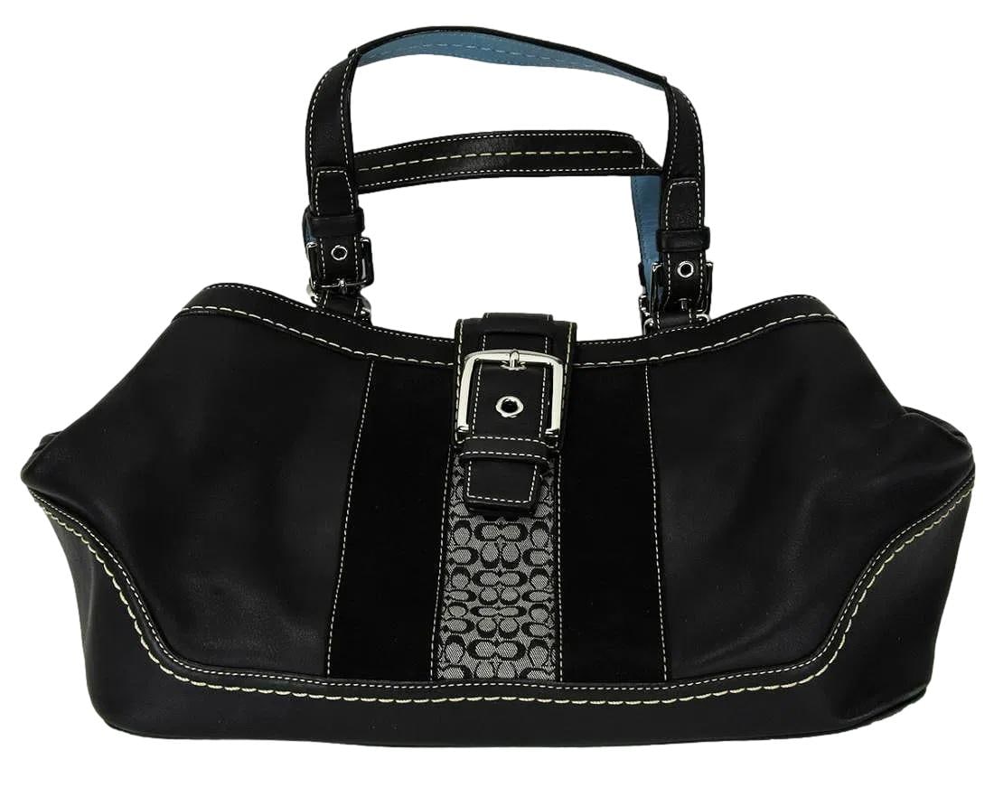 Black Leather and Suede Coach Handbag with Monogram. Certificate of Authenticity - No Reserve: 8" x 14" x 6". This bag is Black on the exterior with Blue Interior. Inside is one zipper pocket and 2 open flap pockets. Magnetic Front Snap Closure