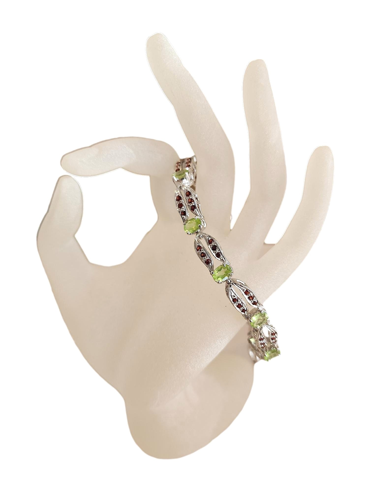 Jewels of India Hand Crafted Silver Bracelet with Genuine Peridot and Garnet Stones. Toggle Close.: 8". Purchased at a show. The stones are Peridot and Garnet. I have tested the stones.