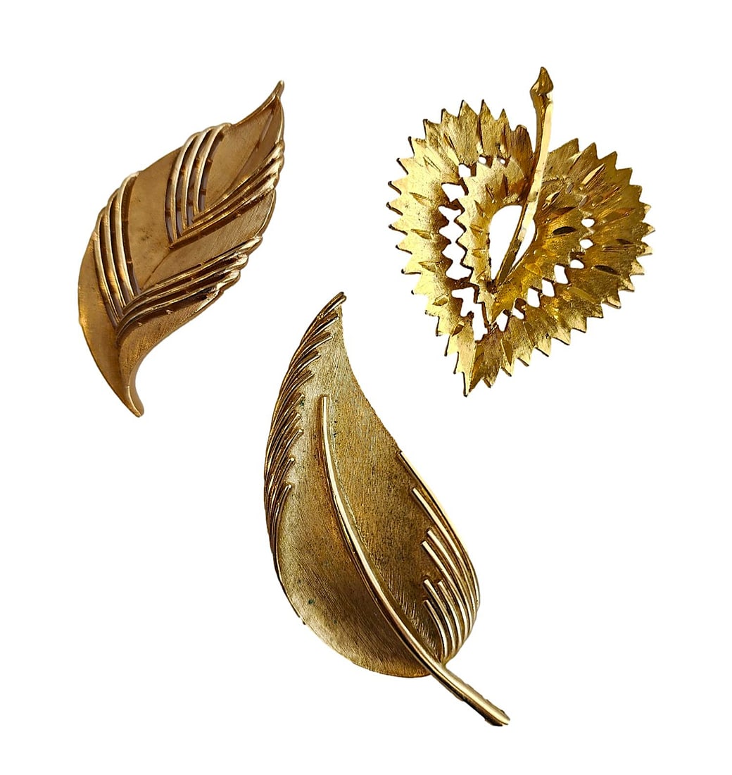 3 Gold Tone Metal Leaf-Shaped Brooches. 2 Trifari and 1 Mamselle.: 2" to 2 3/4". All Marked.