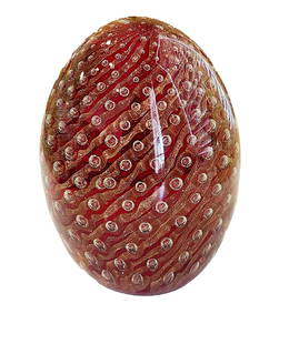 Red and Gold Egg-shaped Glass Paperweight w/ Ribbon Design. Unmarked.: Small Bubbles Follow the Ribbon Pattern. 3 3/4" x 3" wide. Unmarked.