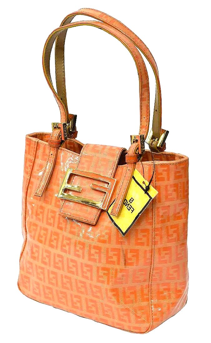 Orange Monogram Patent Canvas Fendi Zucchino Handbag - COA: Vintage, this small/medium Fendi is so unique. It features Gold toned hardware. The Fendi Logo Buckle Closure is gold and orange and snaps. The interior is a beige cloth lining with Fendi monogram. Th