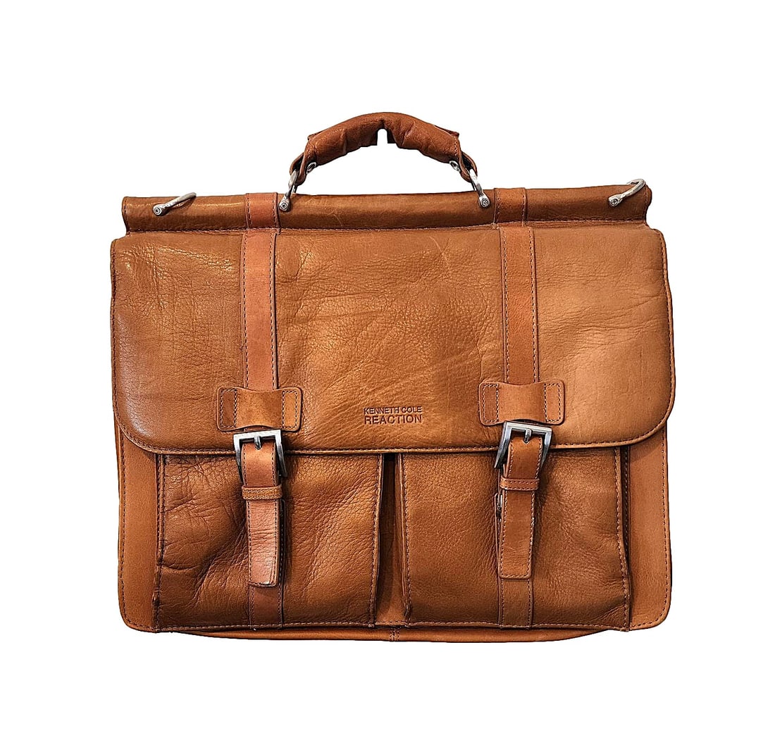 Kenneth Cole 'Reaction' Leather Brief Case - New: New without tags. Computer bag or case. Brown leather. back pocket with flap, front has 2 flap compartments and center compartment with pockets. I do not have the shoulder strap. No reserve. Measures: