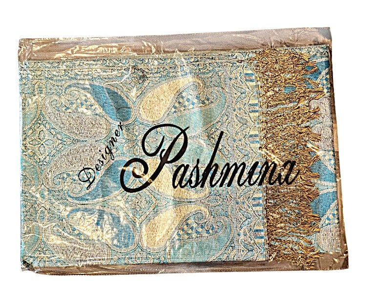 Blue Silver and Tan Pashmina Scarf - Metallic threads throughout. New: This group of Pashmina Scarves feature silver metallic threads throughout. The color combinations ore very unique. These scarves are new in packaging. 45% silk / 55% Pashmina.