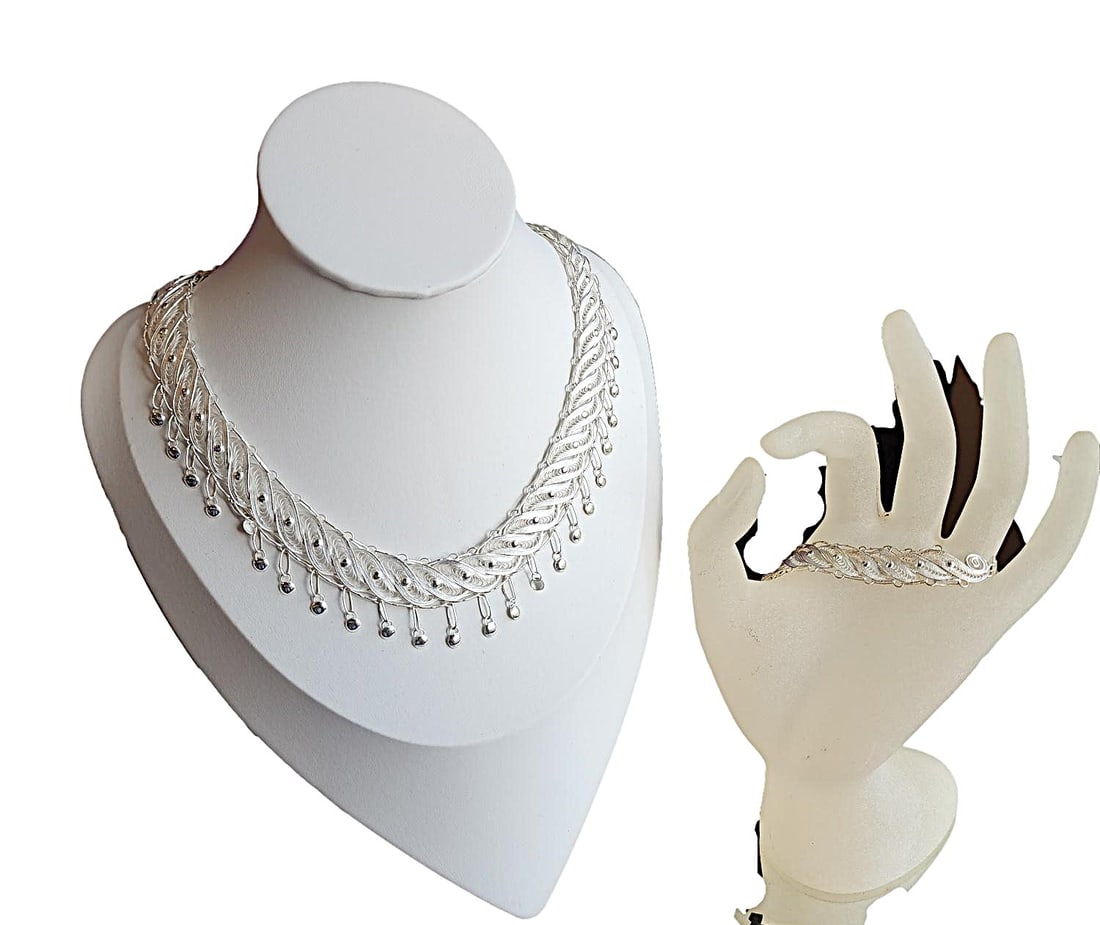 Beautiful Filigree Sterling Silver Choker and Bracelet Set - 15" and 7": Part of our sterling silver collection. Stamped 925. Filagree feather motif. Very delicate. These would make nice gift sets. The choker is 15". The feather style links include small round drops dangli