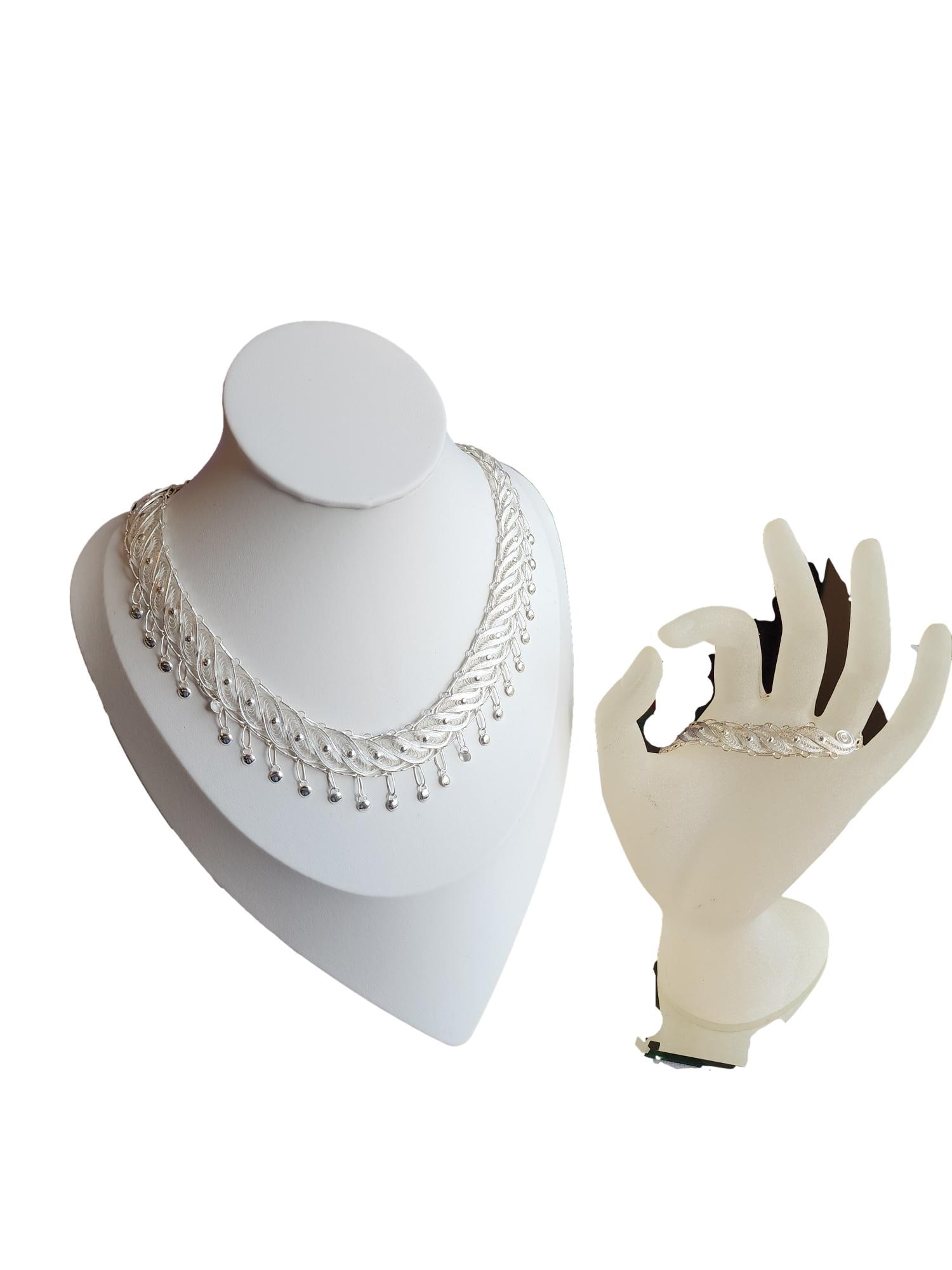 Beautiful Filagree Sterling Silver Necklace and Bracelet Set - 15" and 7": Part of our sterling silver collection. Stamped 925. Filagree feather motif. Very delicate. These would make nice gift sets. The choker is 15". The feather style links include small round drops dangli