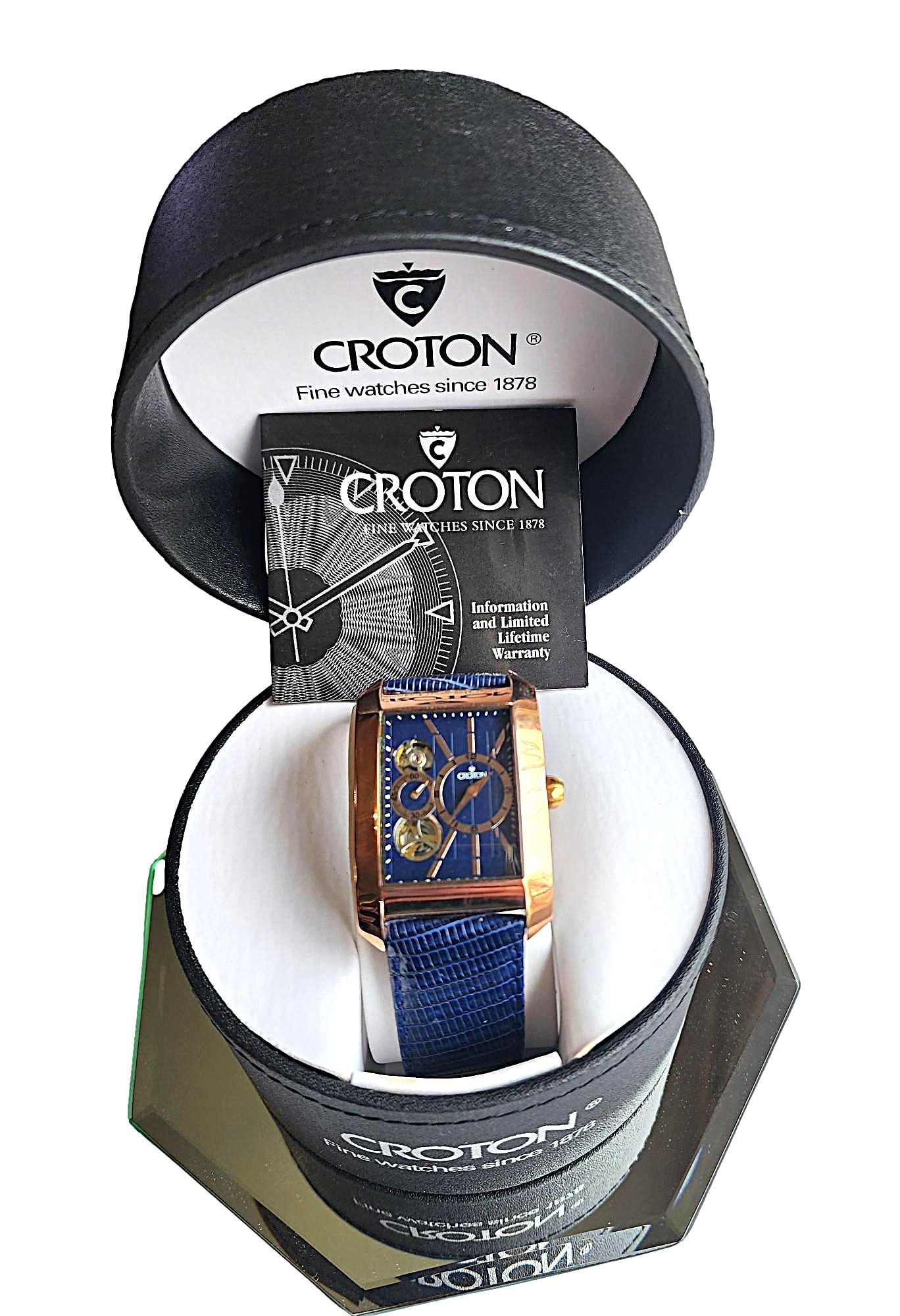 Vintage Croton Men's Wristwatch w/ Blue Leather Band - New w/ box.: This watch features a rectangle watch face with Rose Gold Plated Stainless Steel Case. Japanese Automatic Movement. Hinged locking band closure. I have the booklet for this watch. Because this watch i